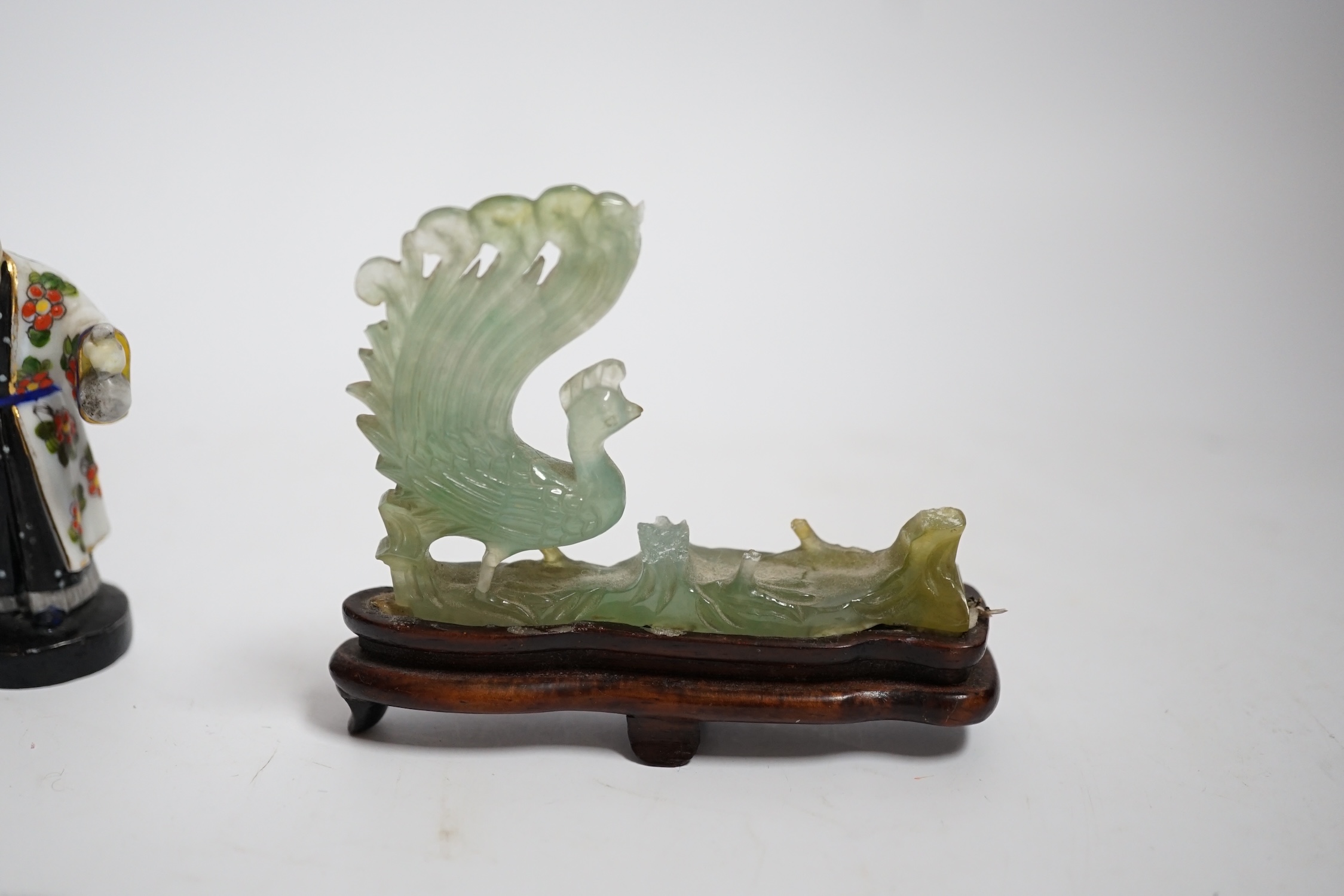 Four Chinese figures, including two jadeite examples, largest 7.5cm wide